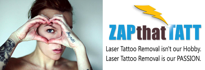 Ad with woman with tattoos looking through hands in the shape of heart.